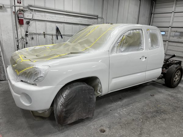 Tacoma masked and prepped in the paint booth