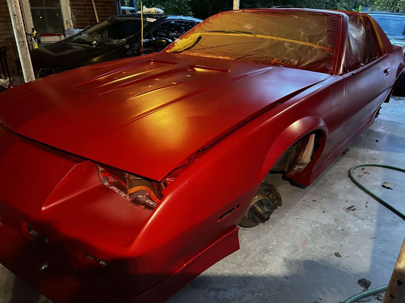 Candy-red Camaro repainted at J&J Automotive Repair